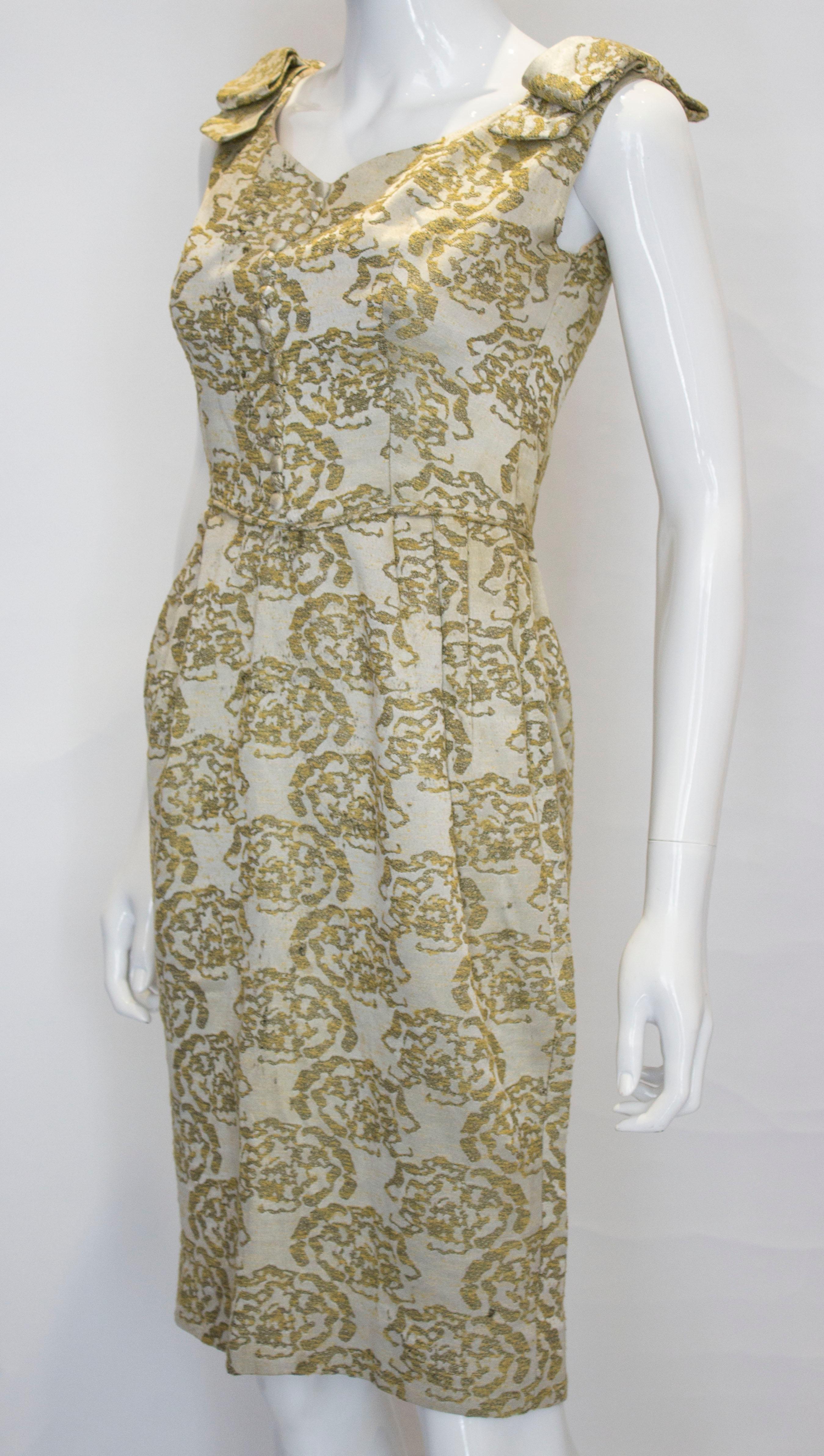 Beige A vintage 1950s - 1960s olive green & gold brocade cinch wiggle cocktail dress