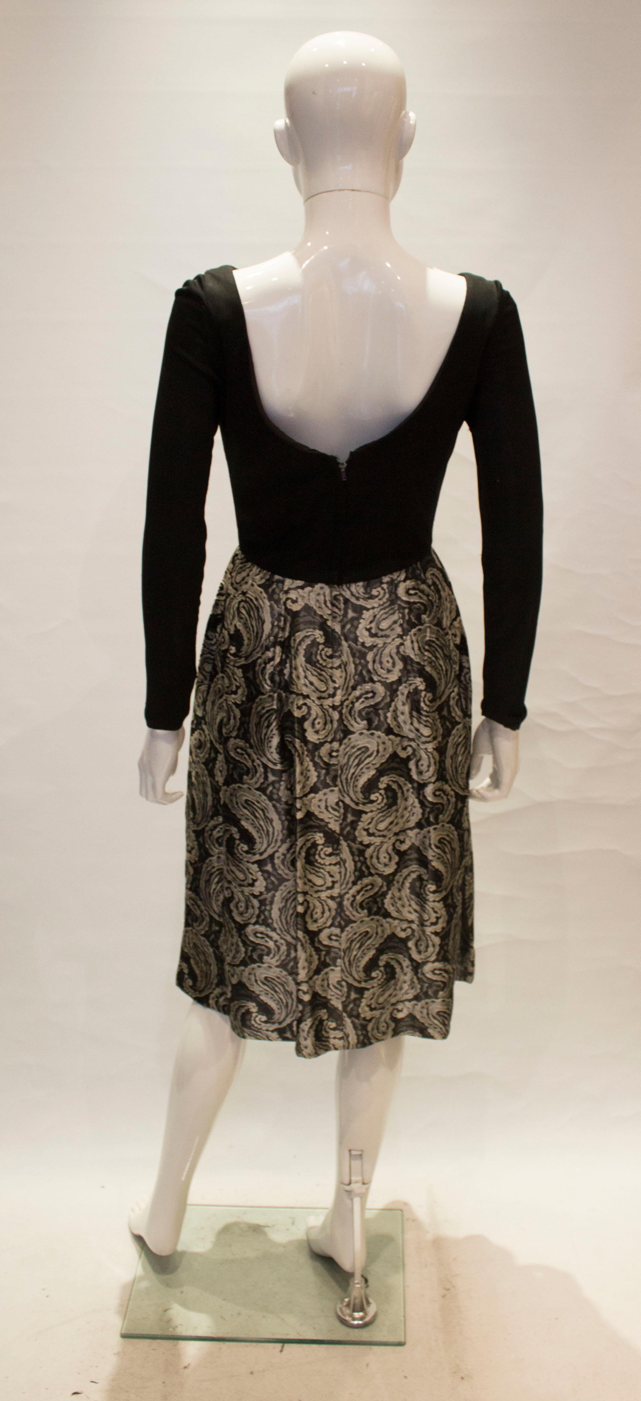 A vintage 1950s silver and black brocade party low back paisley dress small In Good Condition In London, GB