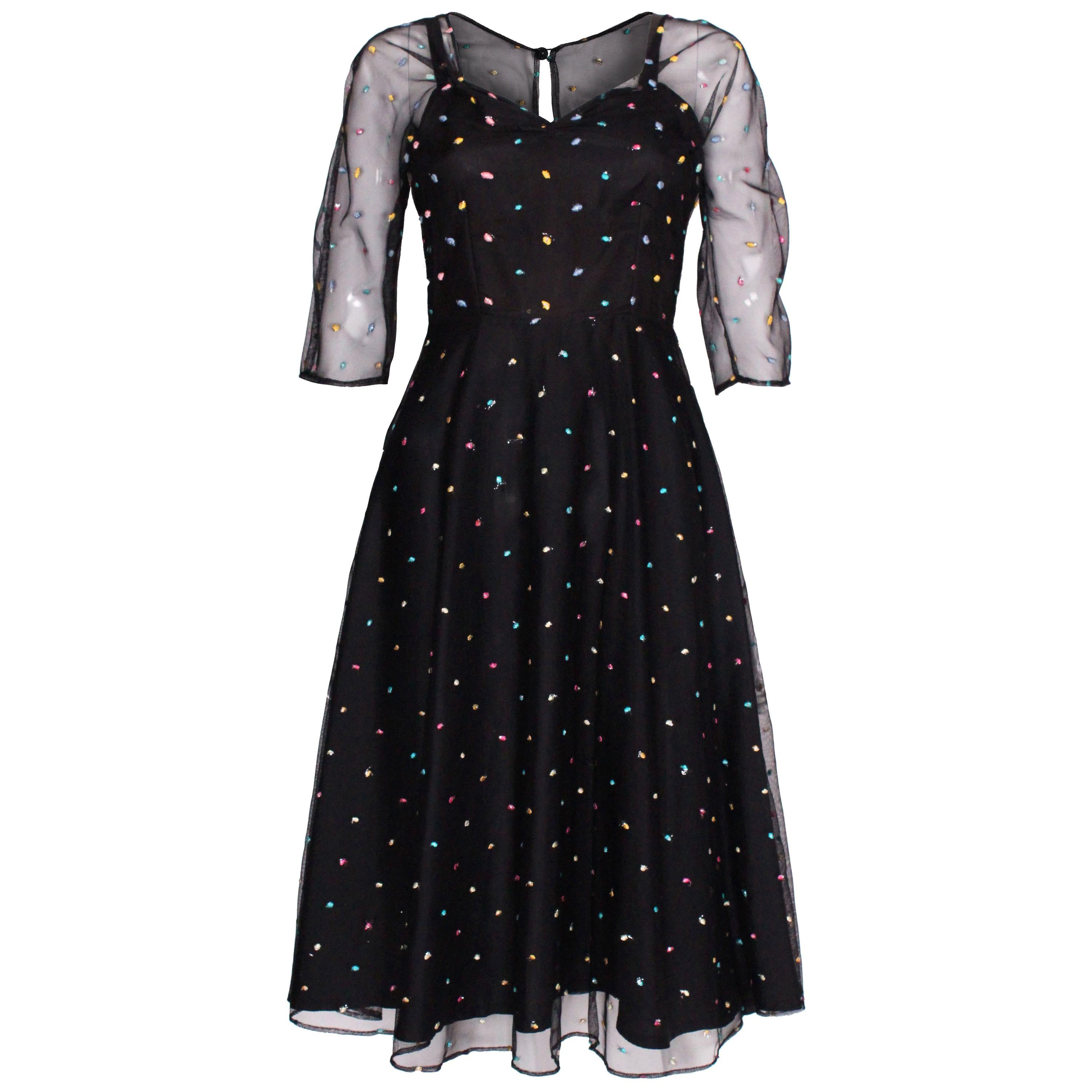 un vestido de fiesta vintage de lunares de los años 70 de Radley