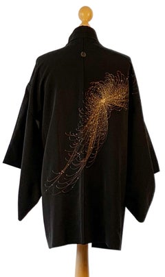 A vintage 1970s silk kimono with silver woven Chrysanthemum flowers