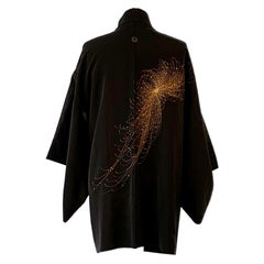 A vintage 1970s silk kimono with silver woven Chrysanthemum flowers