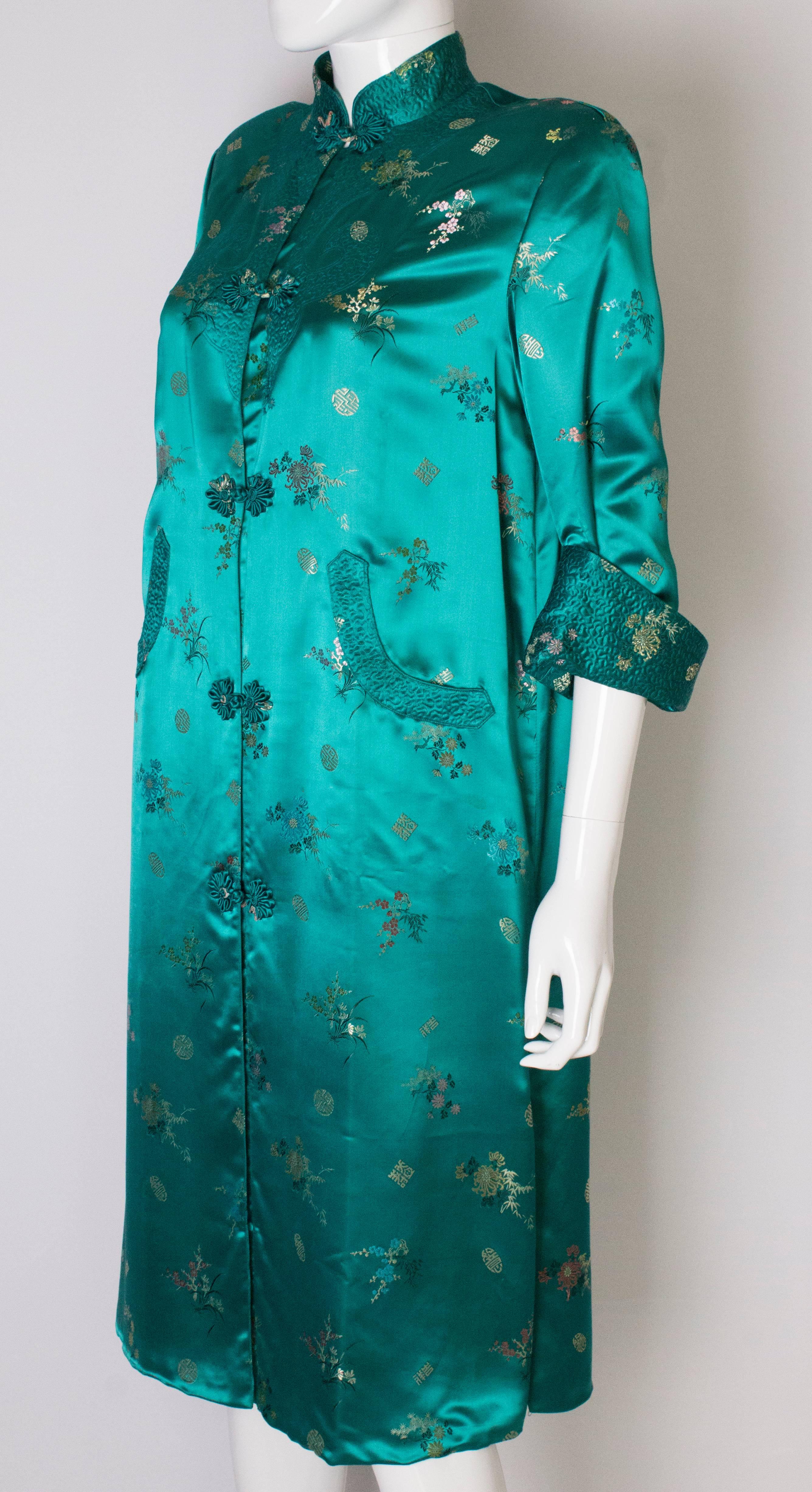 A Vintage 1970s Turquoise Chinese Coat with Stand-up Collar & Decorative Pockets In Good Condition In London, GB