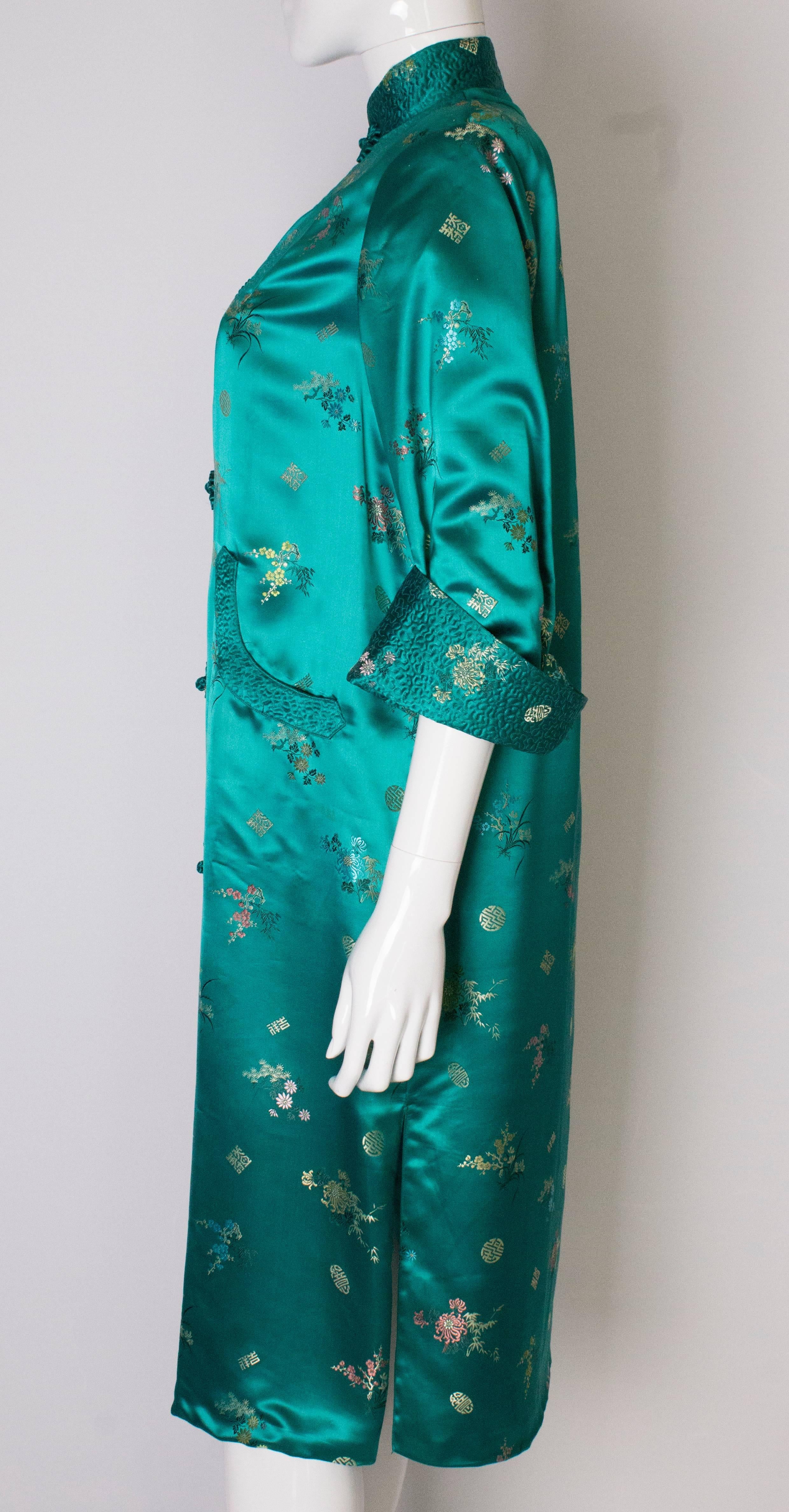 A Vintage 1970s Turquoise Chinese Coat with Stand-up Collar & Decorative Pockets 1