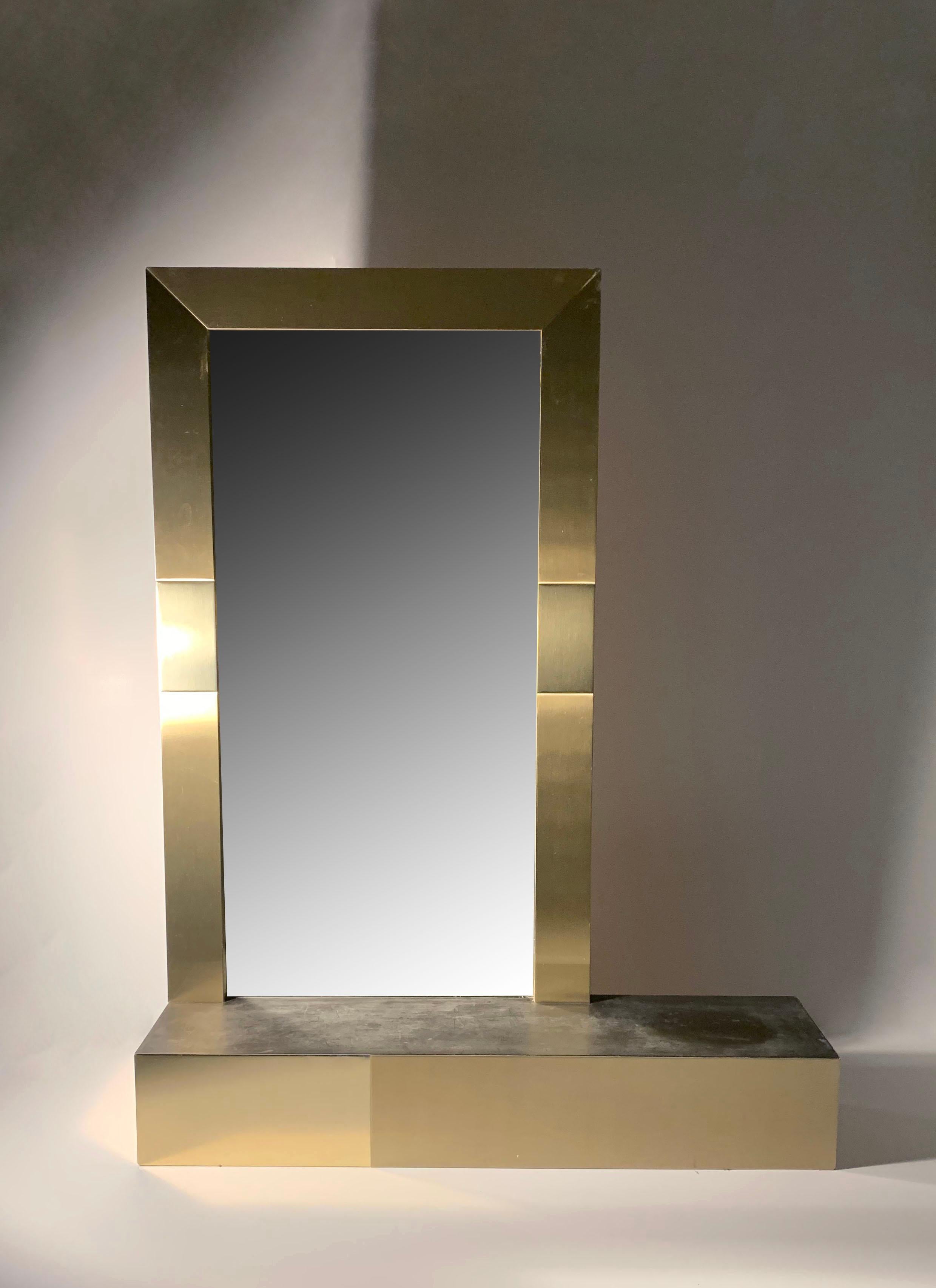 A vintage 1980s Brass Console Mirror with Faux Slate Top attributed to Paul Evans for Directional in the 80s. 

Some vintage wear. More photos available upon request.