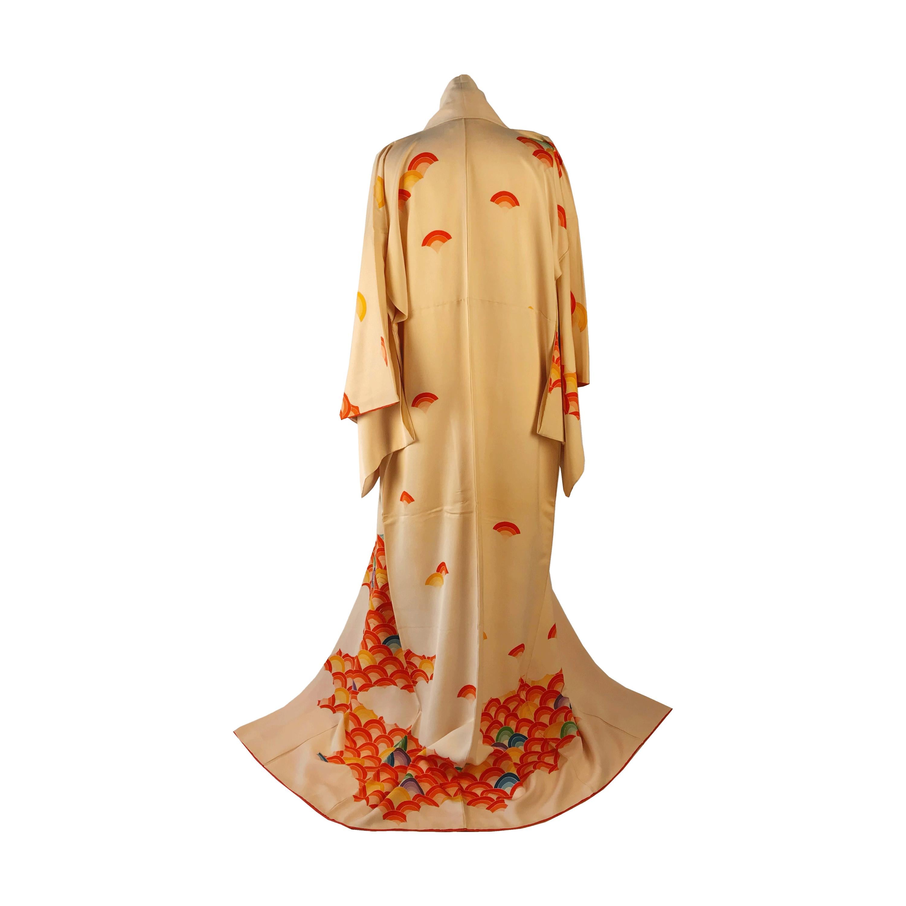 A vintage 1980s silk full length kimono scattered with multi coloured rainbows.