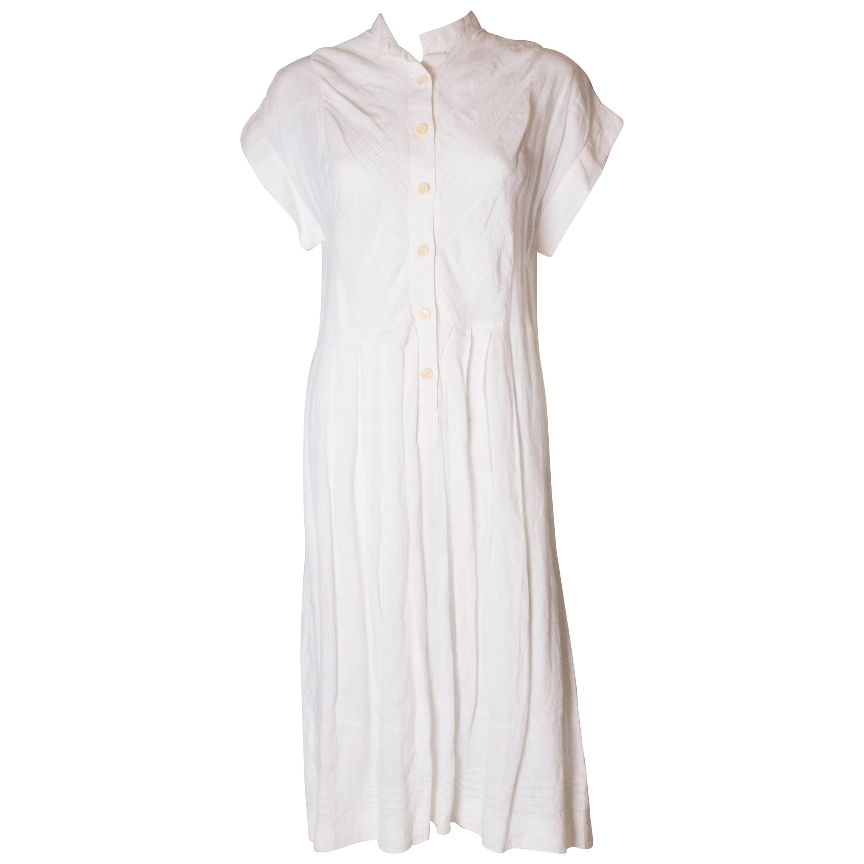 A Vintage 1980s white linen button front day summer dress by Gucci