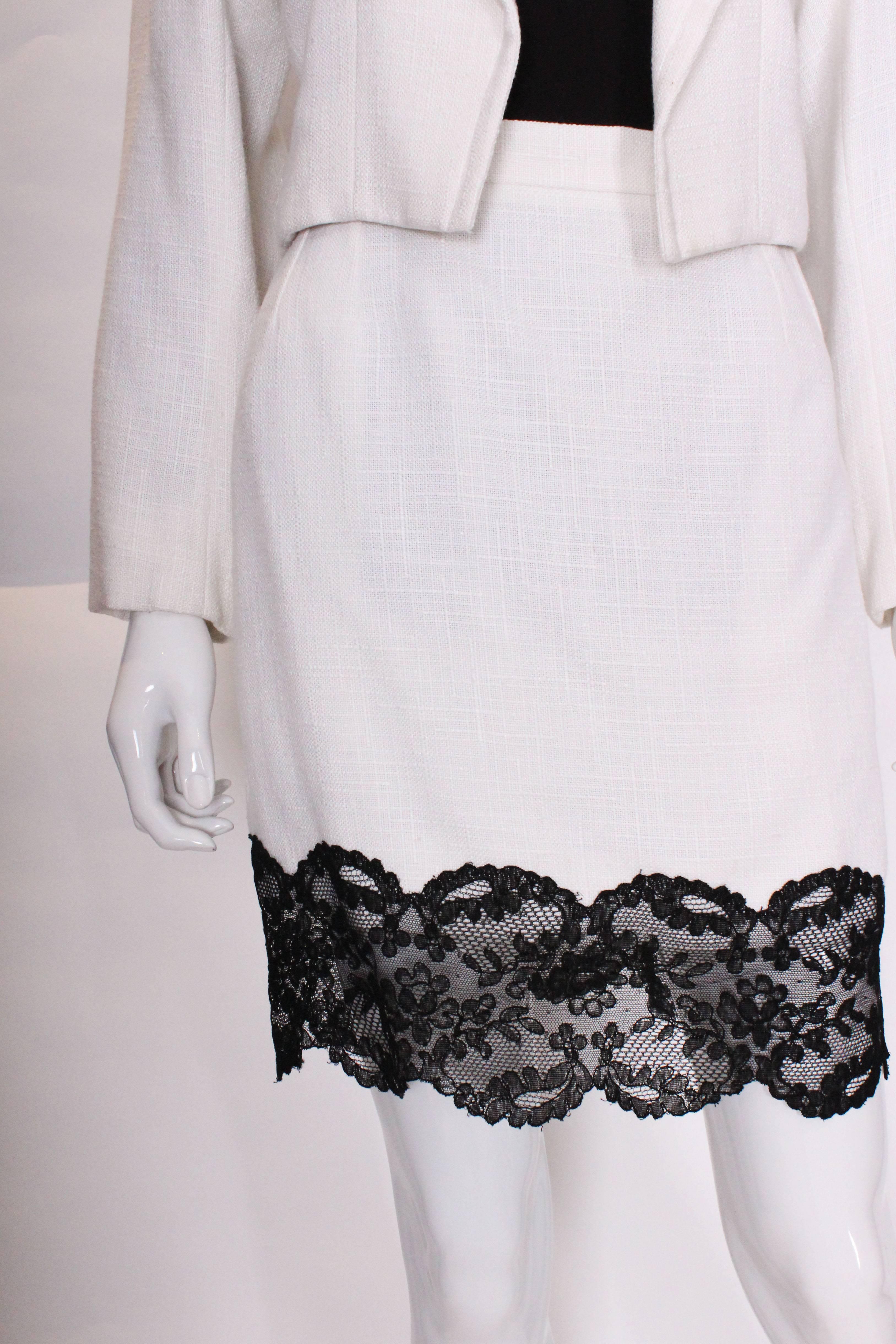 A vintage 1990s white with black lace trim Yves Saint Laurent Skirt Suit 2