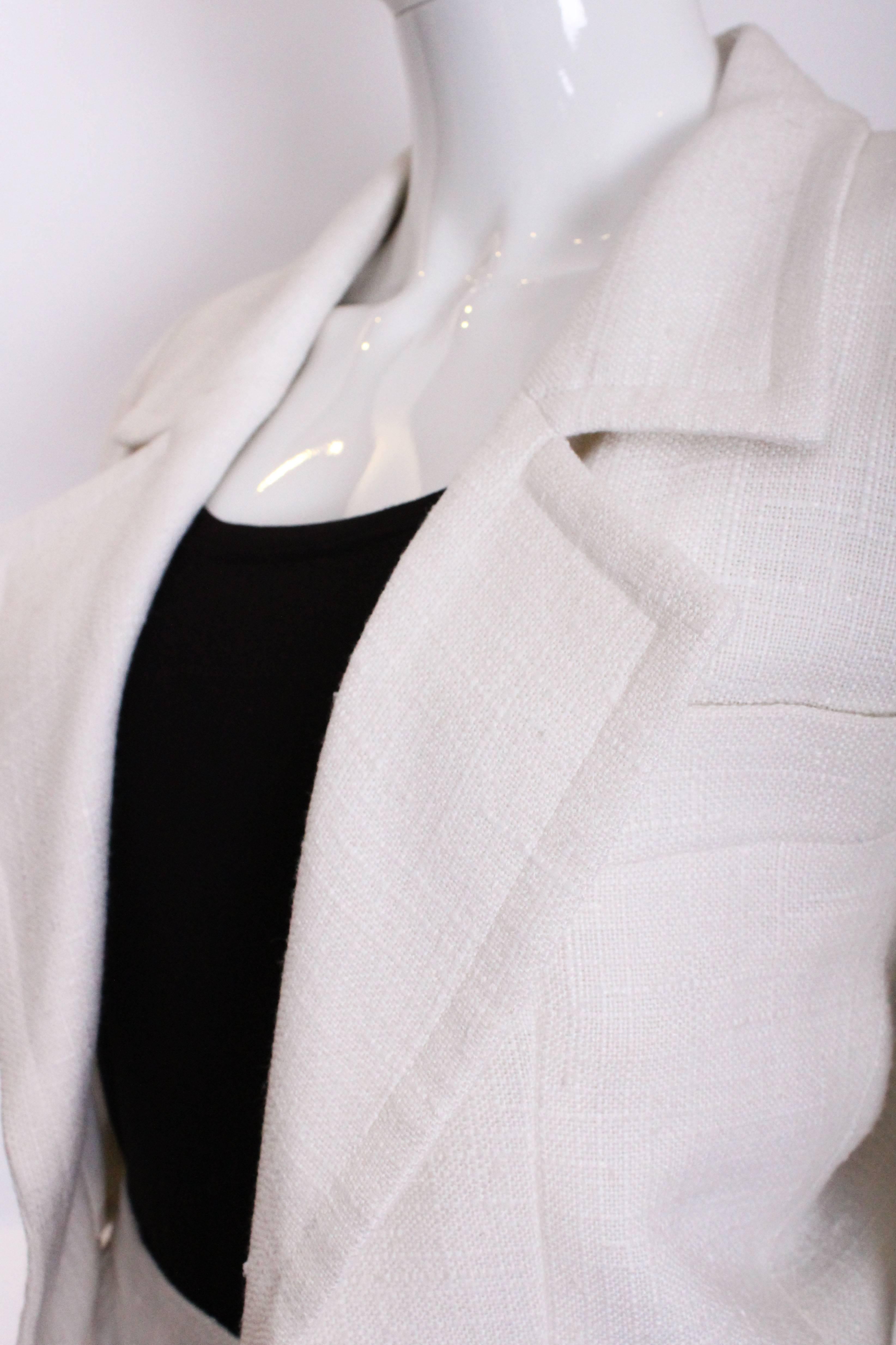 A vintage 1990s white with black lace trim Yves Saint Laurent Skirt Suit 3