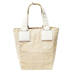 A Vintage 2000s Chanel Beige Canvas Tote Bag in excellent Condition