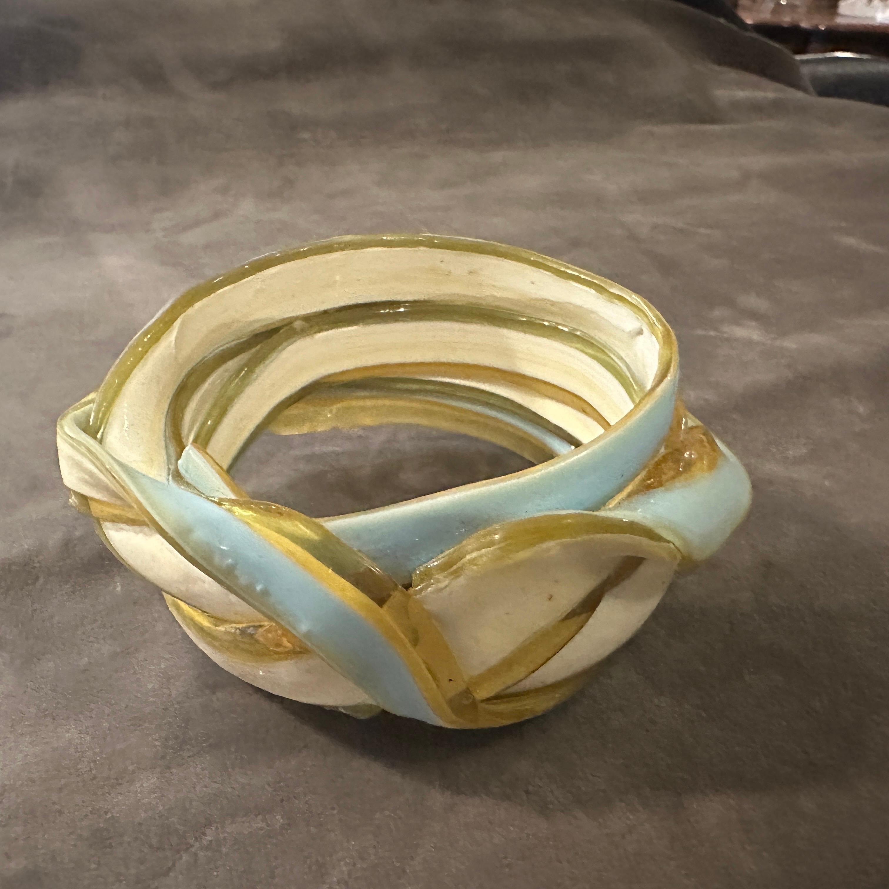 This vintage 21st-century rubber bangle bracelet is a distinctive piece designed by Gaetano Pesce for Corsi Design from the ribbon and spaghetti collection. It features an organic, fluid aesthetic characteristic of Pesce’s experimental approach to
