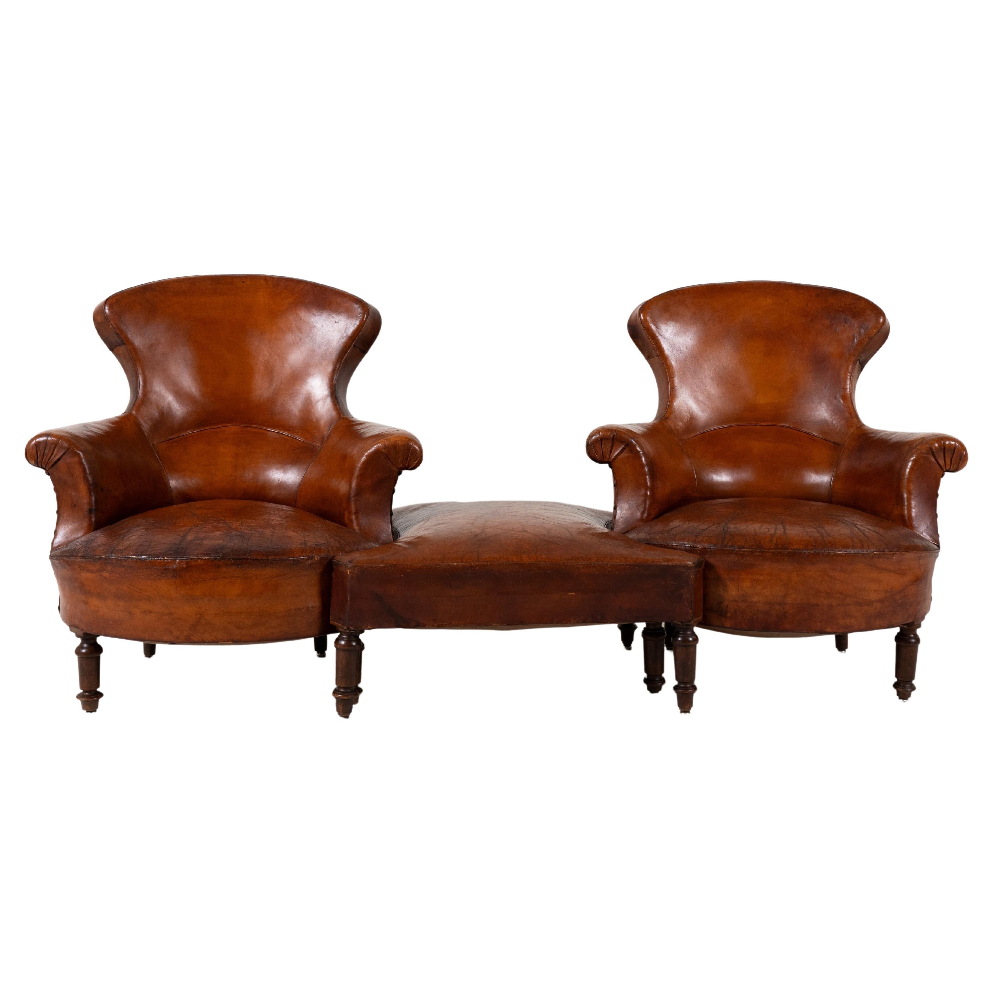 A Vintage 3 Piece Set of Leather Chairs with a Stool, France c.1940
