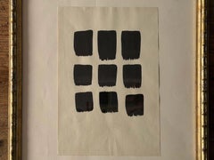 Un disegno astratto vintage a inchiostro su carta, incorniciato in una cornice in legno dorato effetto bambù