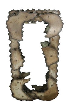 A Vintage American Brutalist Torched Metal Wall-Mounted Mirror, Circa 1970s