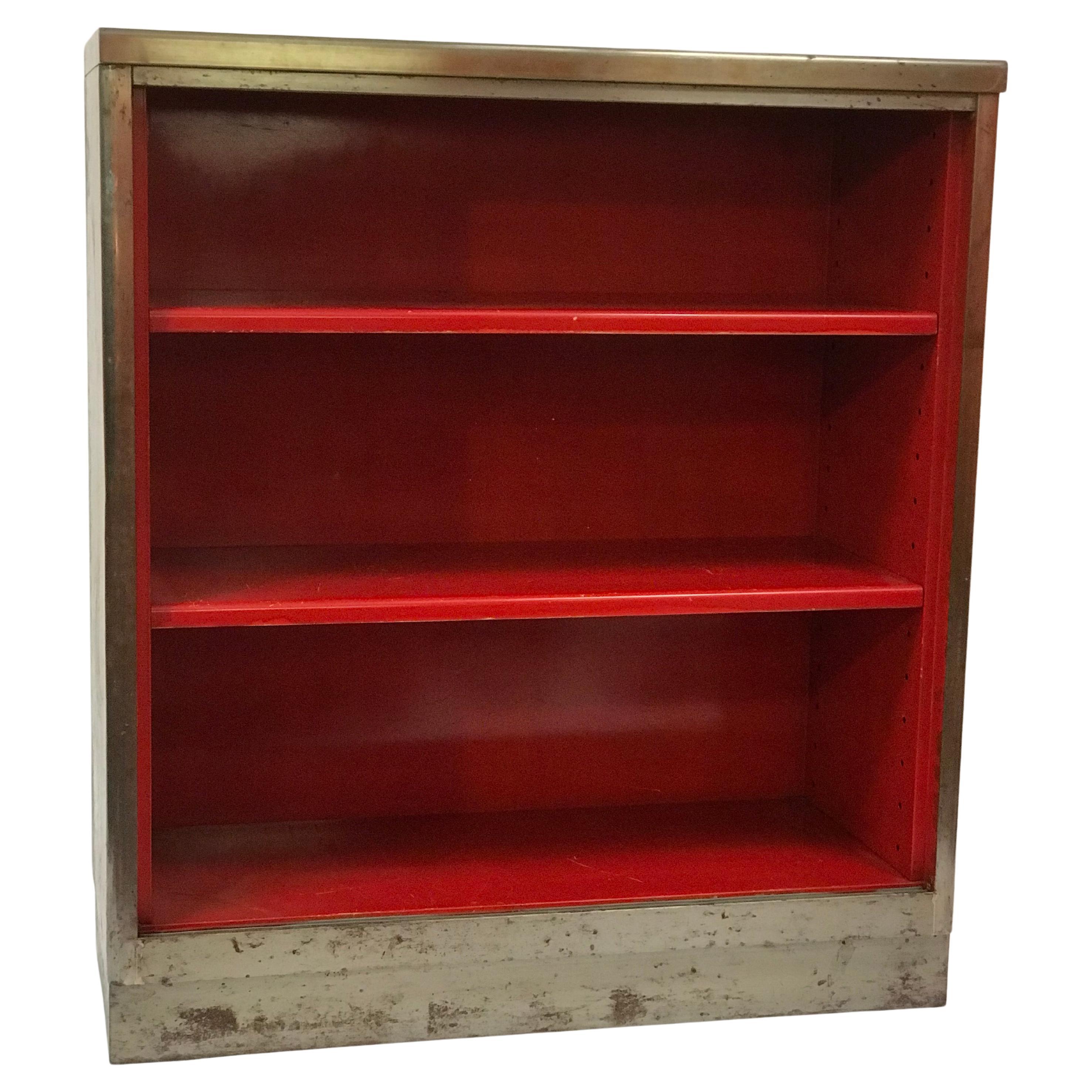 red metal bookshelf
