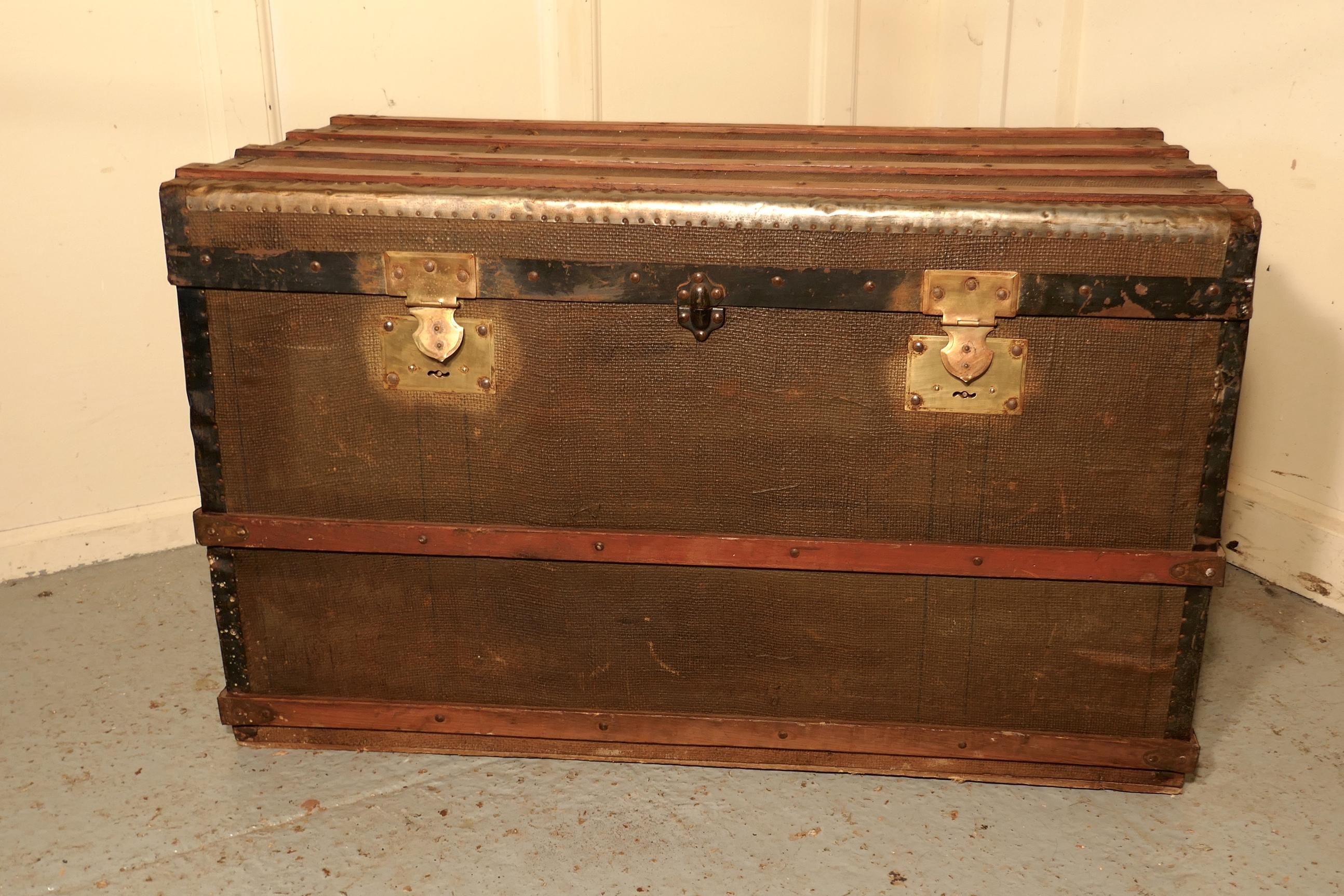 Late 19th Century A Vintage Brass and Bound Canvas Travel Steamer Trunk  A very useful decorative  For Sale
