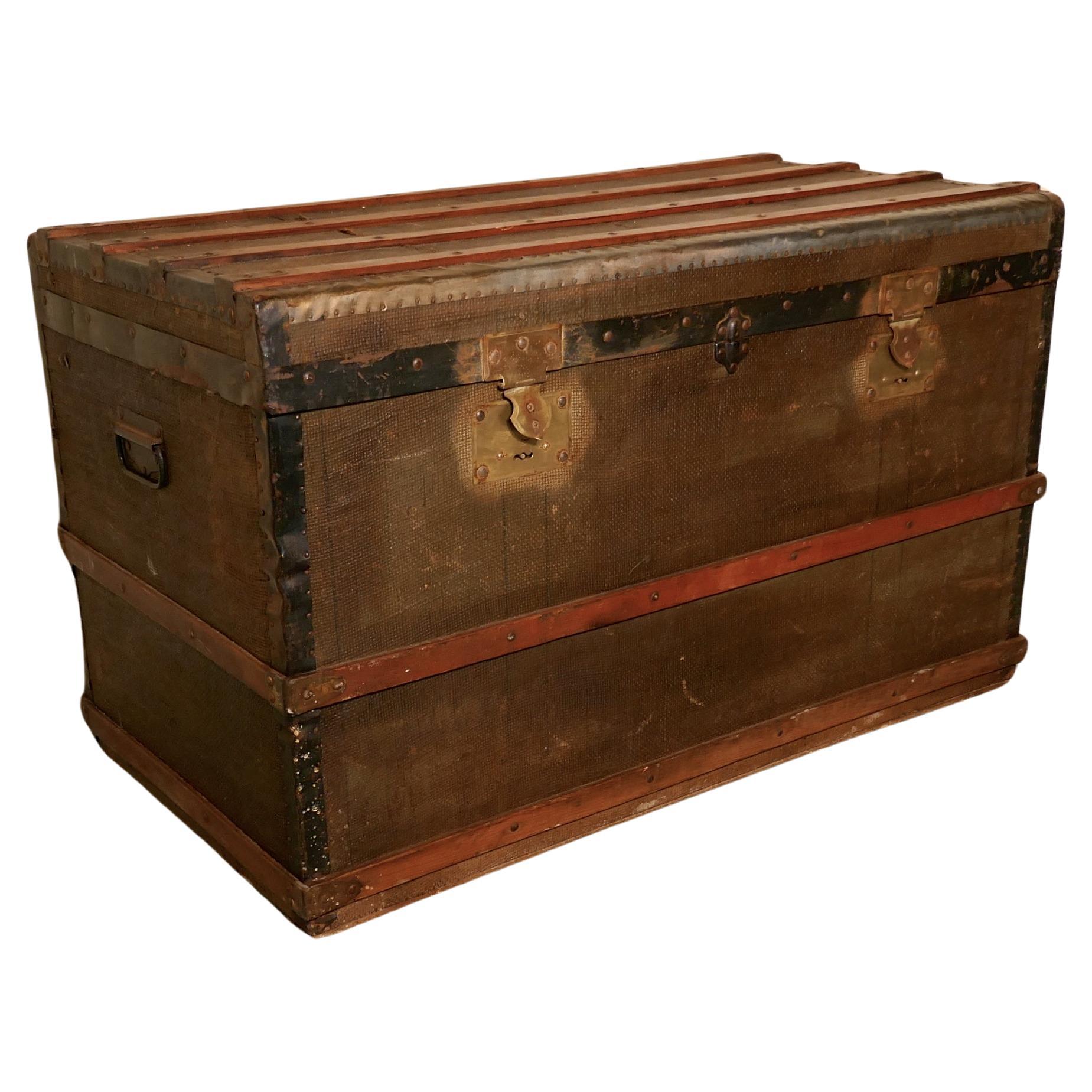 A Vintage Brass and Bound Canvas Travel Steamer Trunk  A very useful decorative  For Sale
