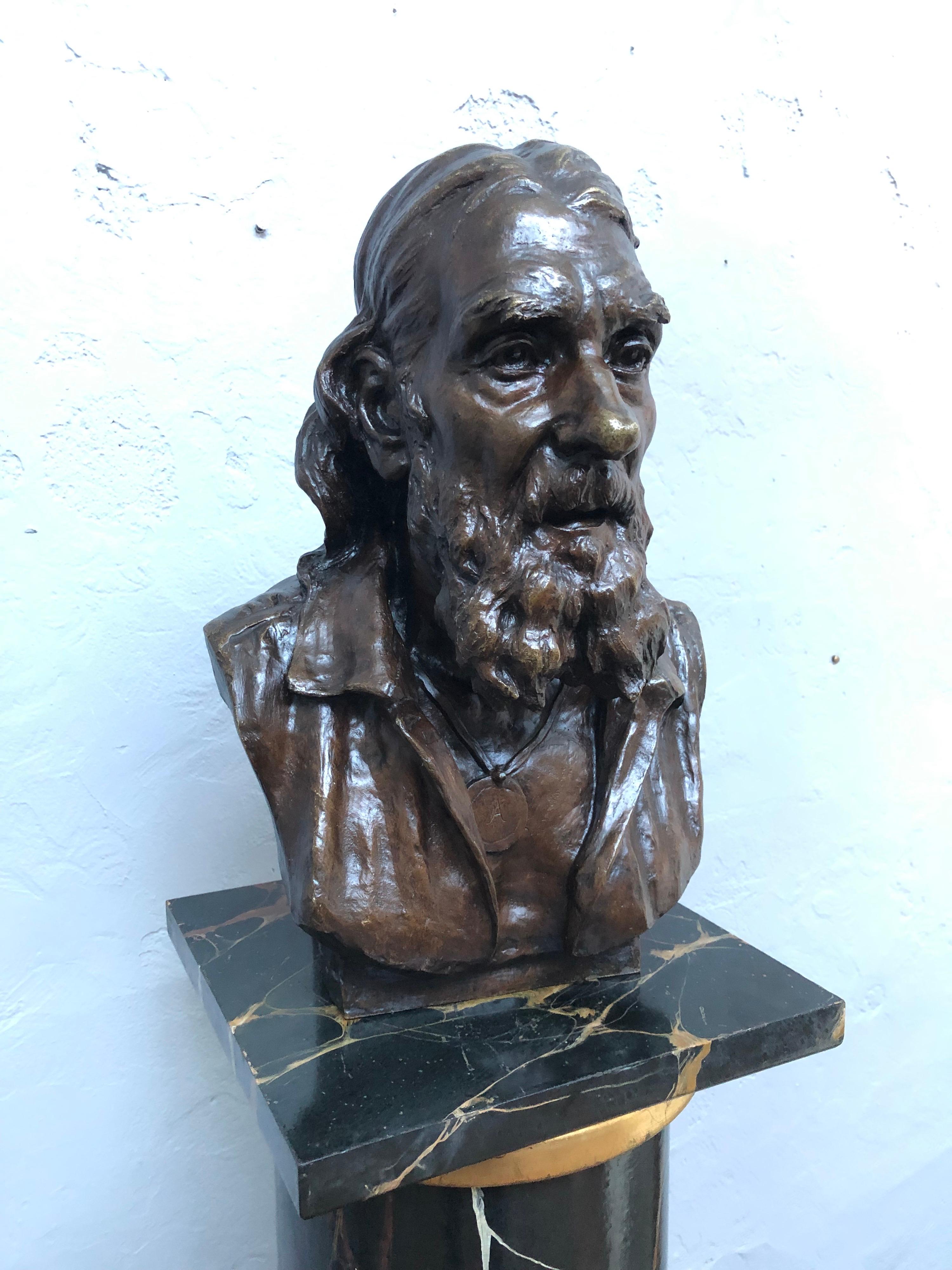 A vintage bronze bust of Armand Petersen. 
Judging by his appearance it could be just after his death in 1969. 
Or it could be a selv portrait just before his death. 
The latter is most likely as it has the date of his birth and not the date of his