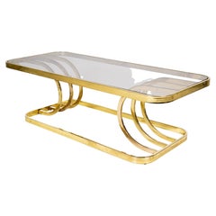 Mesa baja vintage cromada con tapa de cristal