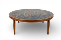 A Vintage Coffee Table with Copper and Enamel Top