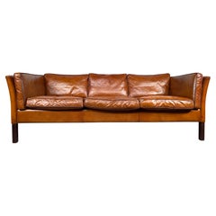 A Vintage Danish 70 s Mid Century Tan Three Seater Leather Sofa
