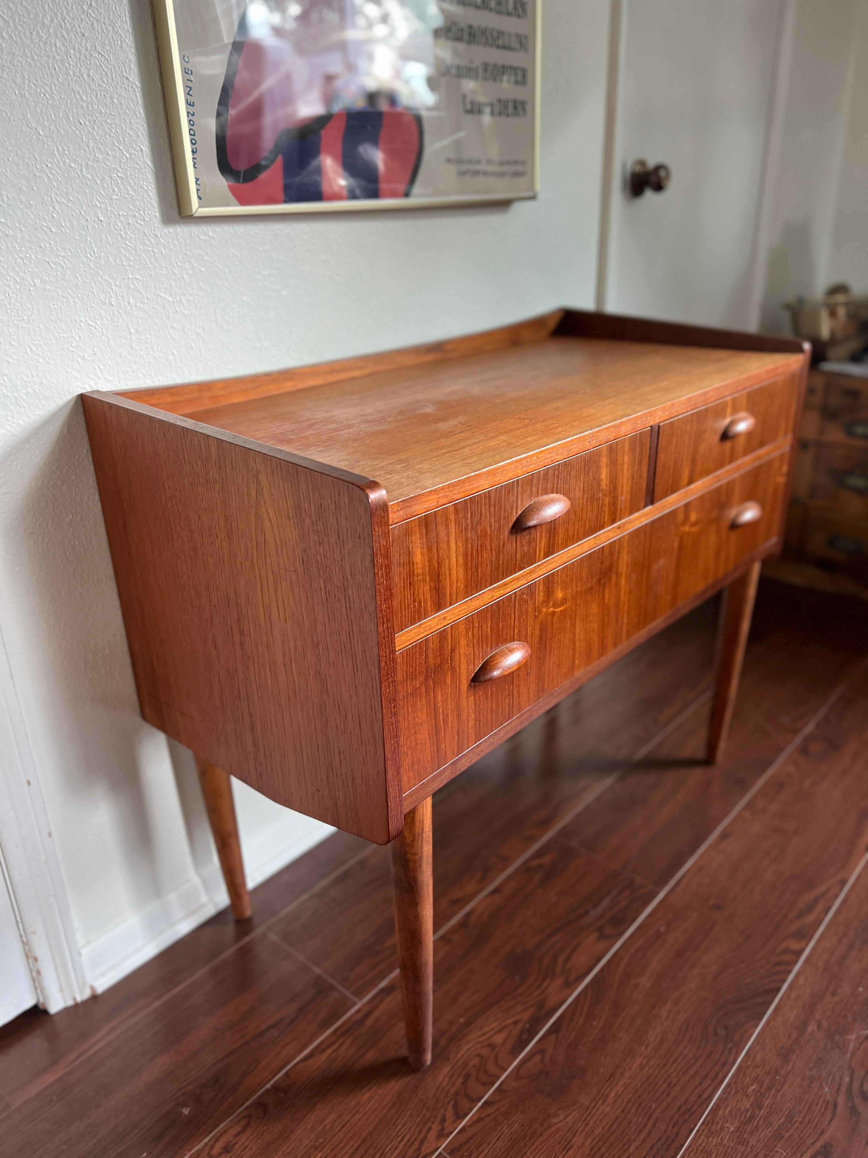 Mid-Century Modern A vintage Danish teak chest or desk with a beautiful teak grain, circa 1960 For Sale