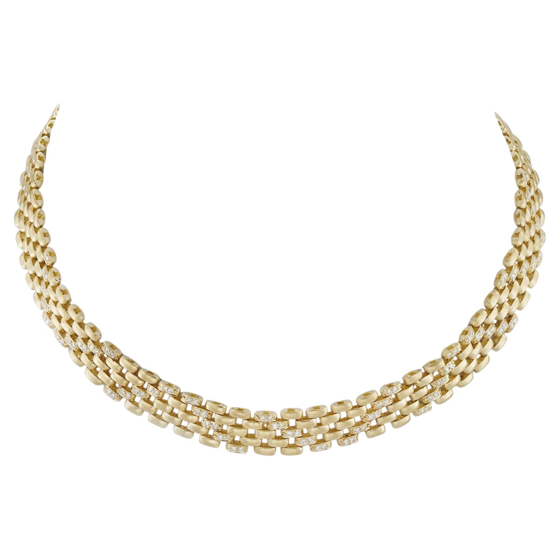 A vintage diamond and gold necklace and bracelet set