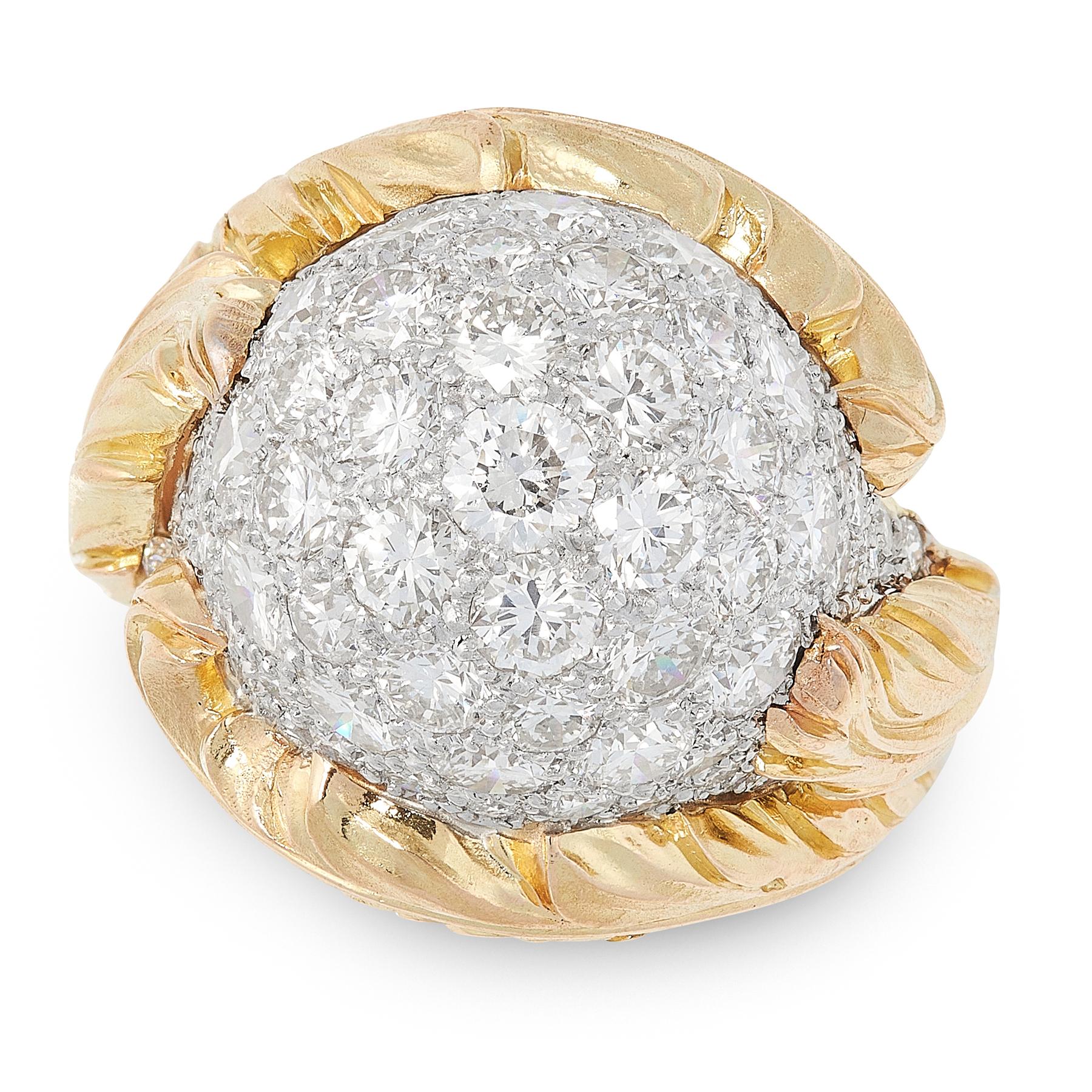 A vintage diamond bombe dress ring, the central ball motif jewelled allover with round cut diamonds totalling 3.5-4.5 carats, within a textured foliate designed band, size N / 6.5.

Gross weight: 16.9g.