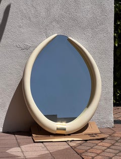 A vintage “elephant tusk” mirror after Karl Springer, circa 1979
