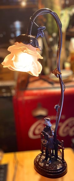 A Vintage Figural Lamp Depicting A Country Girl With Birds Frosted Flower Shade