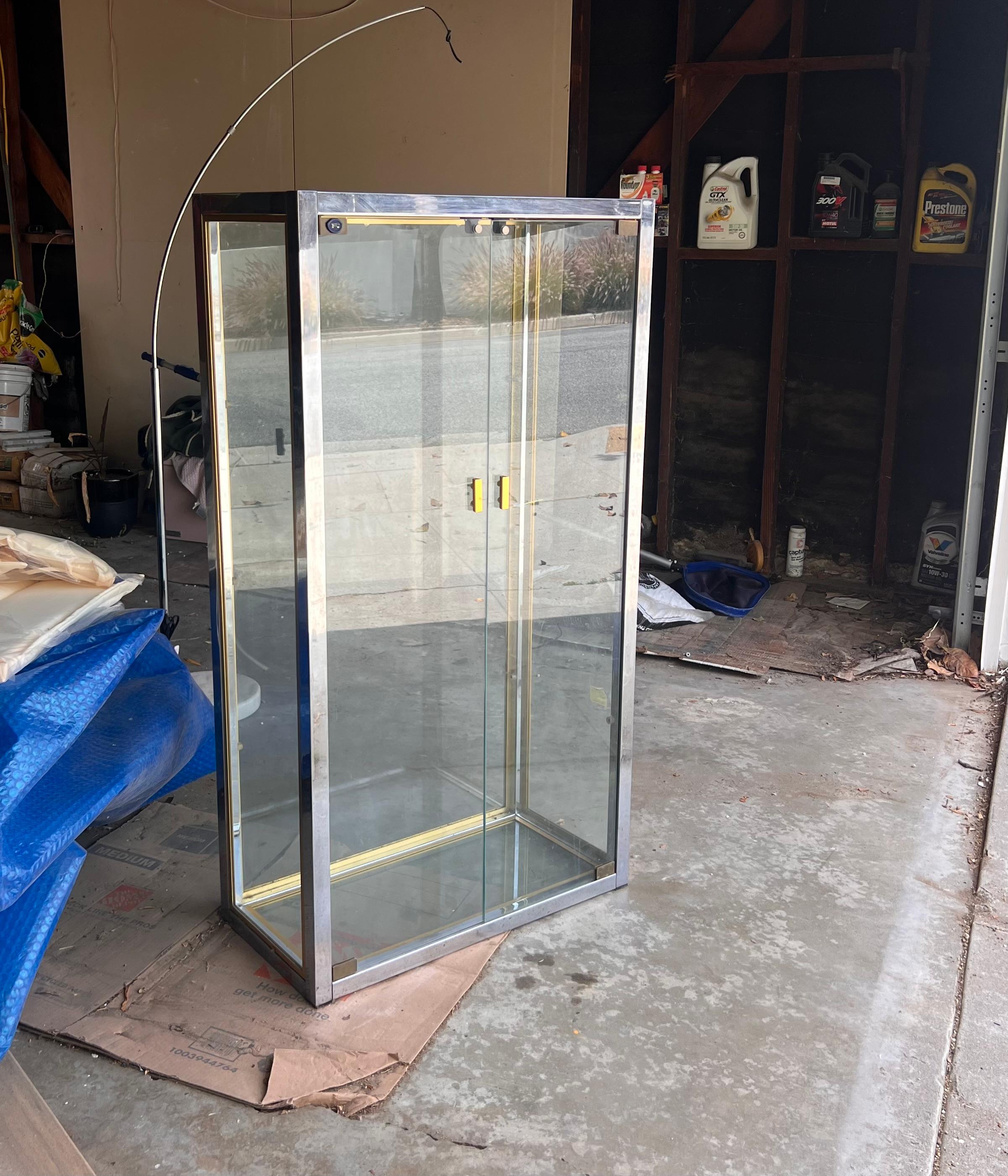 Mid-Century Modern A vintage French glass and chrome curio cabinet / vitrine by Camard, 20th c