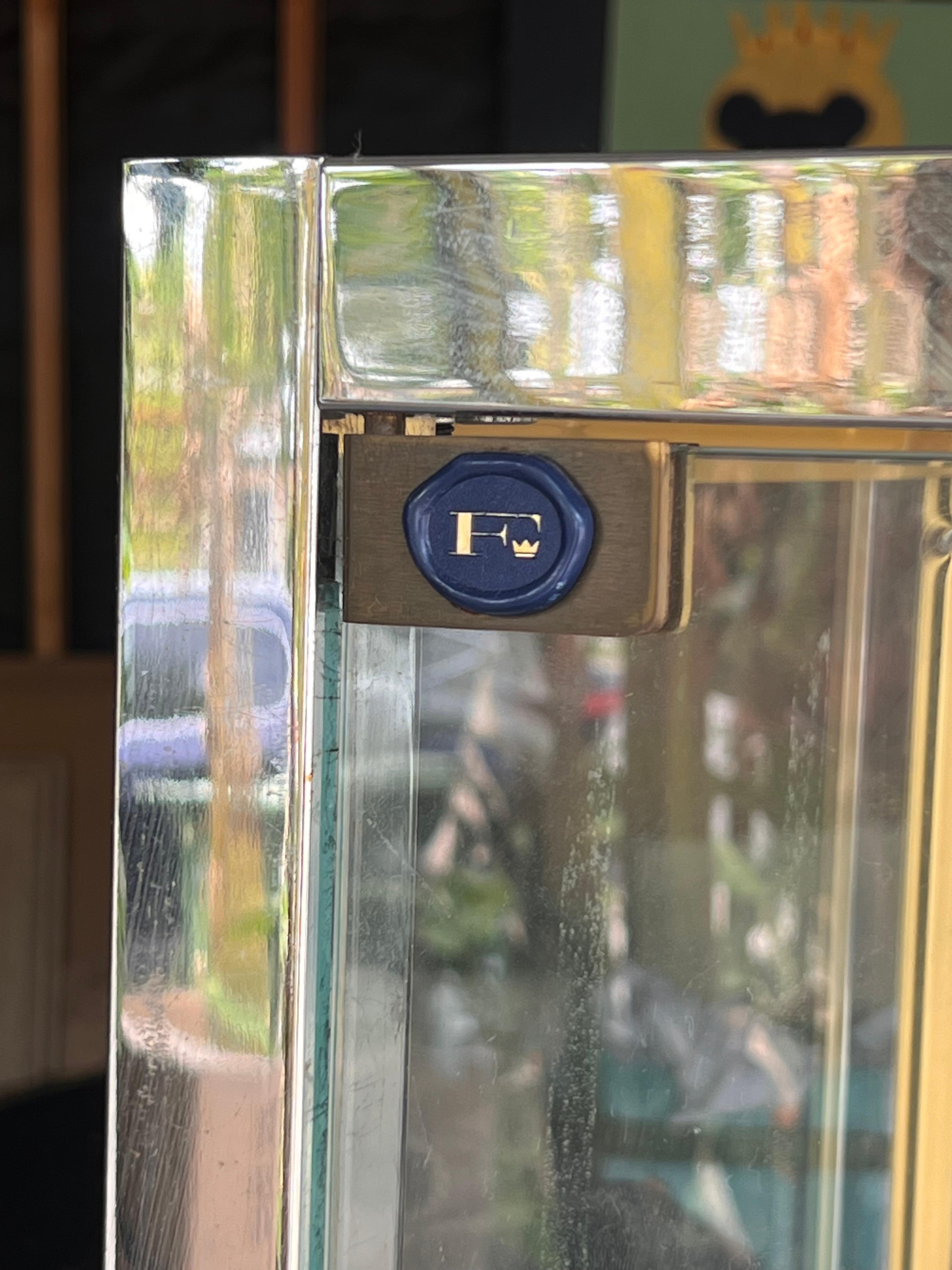 Brass A vintage French glass and chrome curio cabinet / vitrine by Camard, 20th c