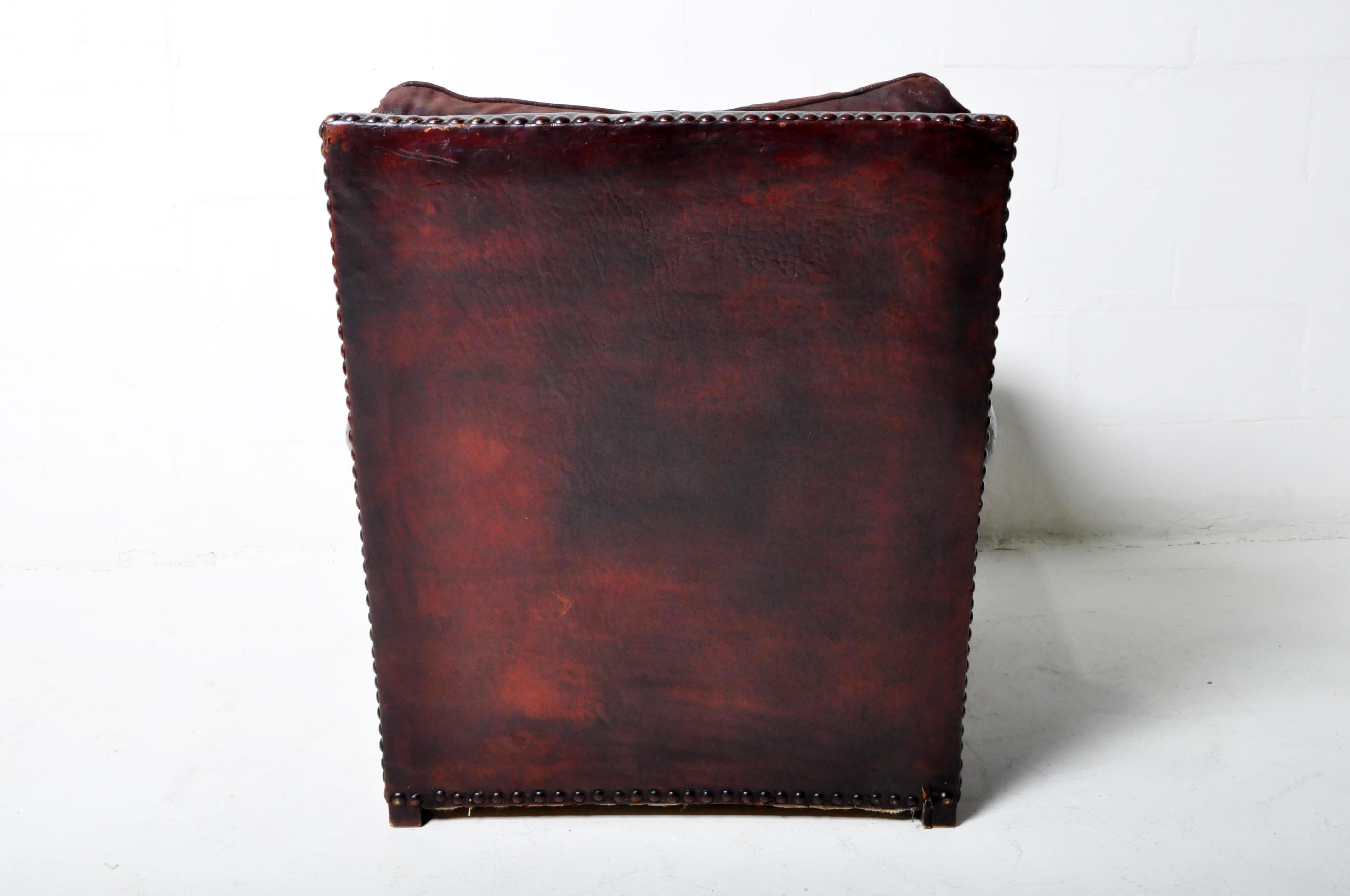A Vintage French Leather Club Chair With  New Fabric Cushions 1