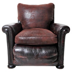A Vintage French Leather Club Chair With  New Fabric Cushions