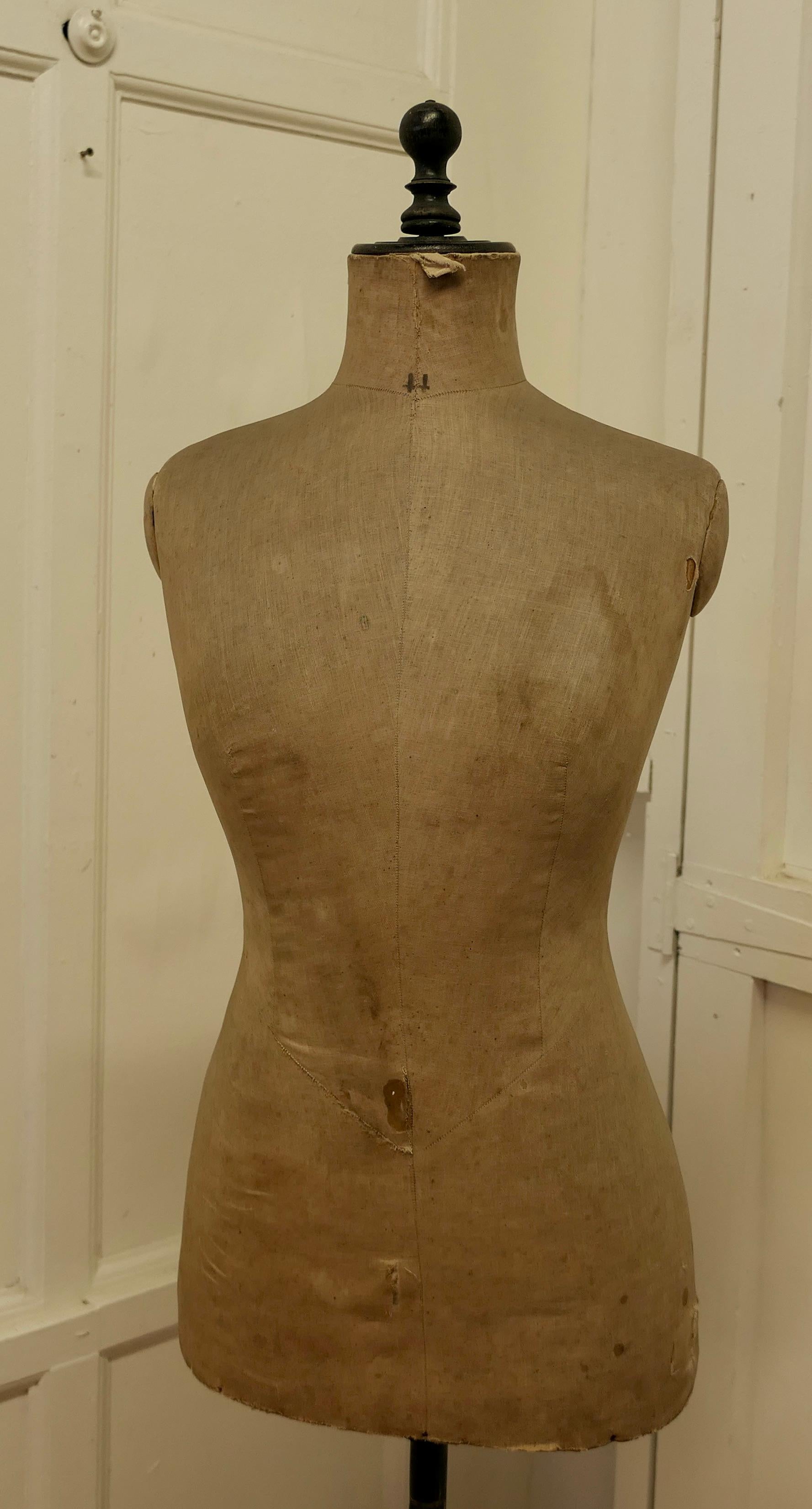 A vintage French Mannequin 

The Mannequin or Tailors Dummy, dates from around 1900 the mannequin is in original condition, the age darkened linen is slightly tatty and the Stand has little woodworm, this has been killed
The Dummy stands 61”
