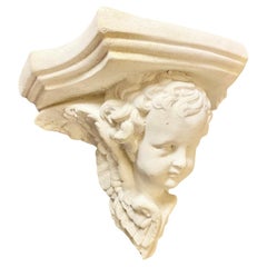 A Vintage French Plaster Neoclassical Style Cherub Angel Wall Bracket