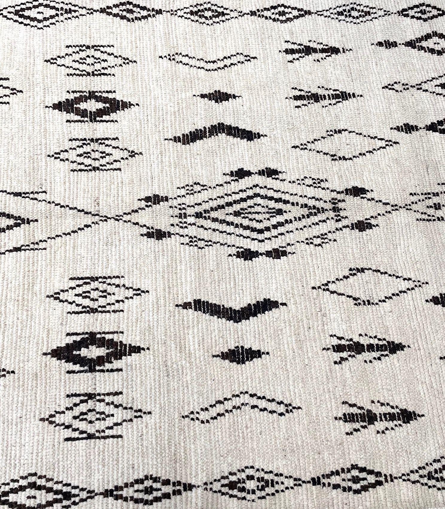 A vintage handwoven Moroccan berber rug, with tribal pattern For Sale 10