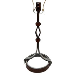 A Vintage Iron and Leather Lamp