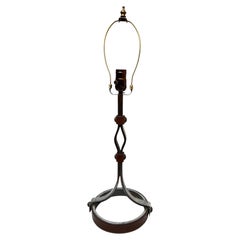 A Vintage Iron and Leather Lamp