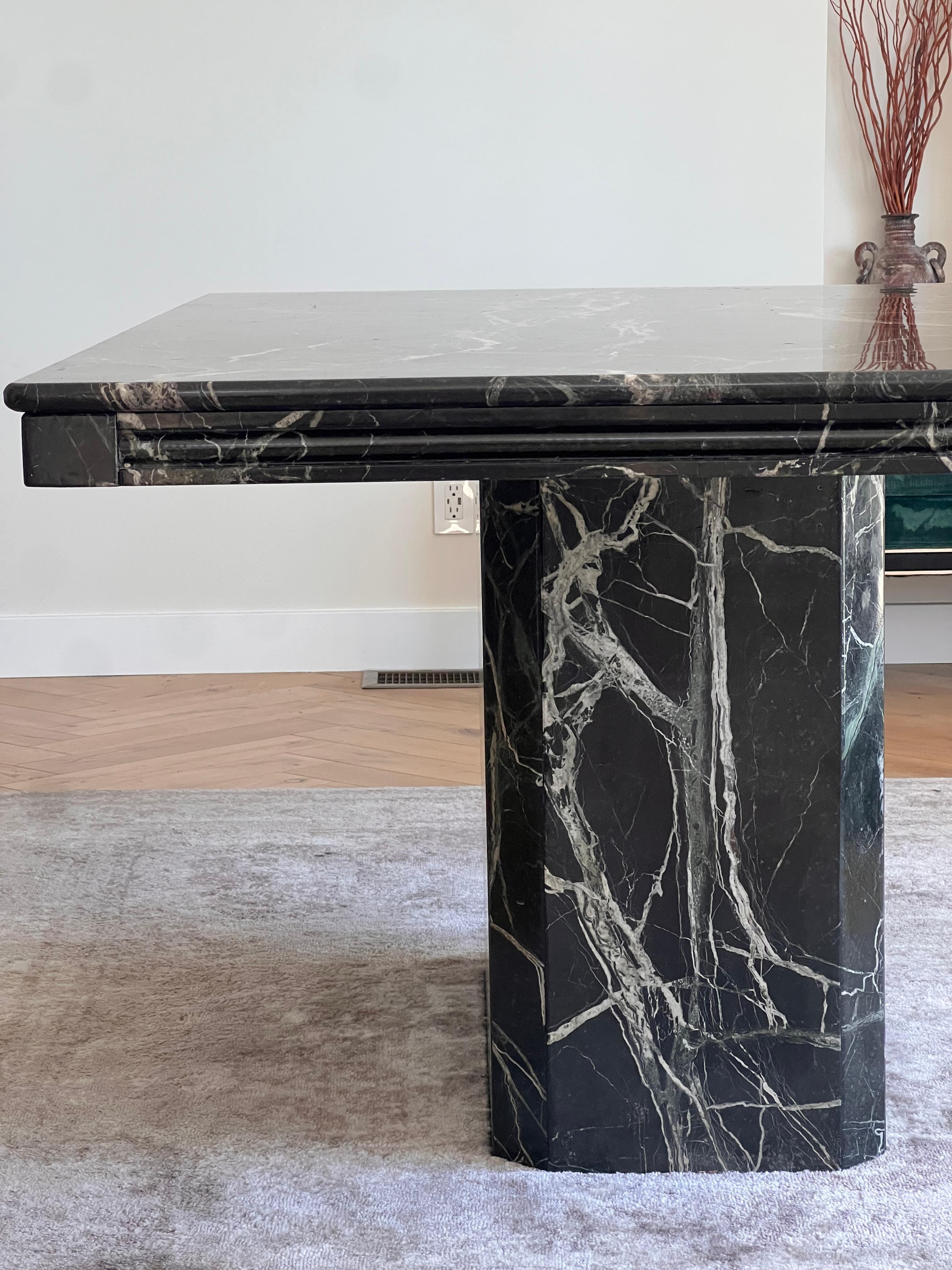 A vintage Italian black marble dining table, 20th century 7