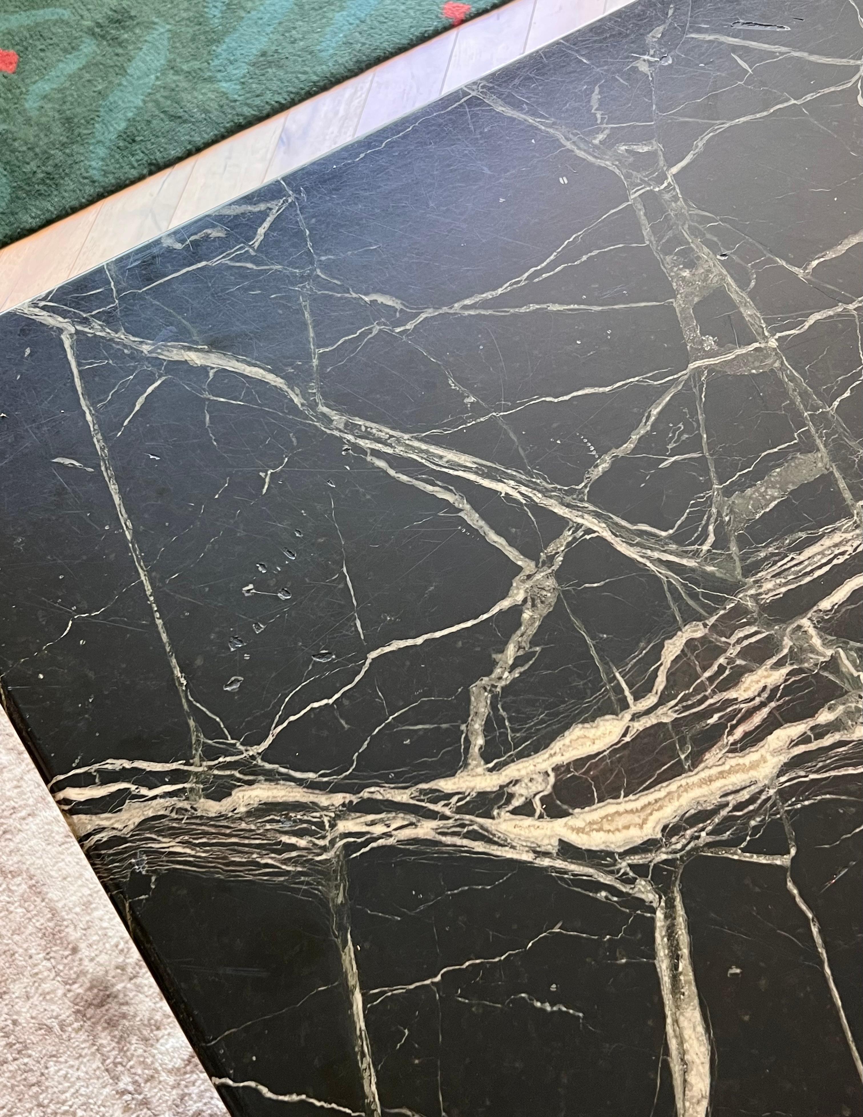 A vintage Italian black marble dining table, 20th century 12
