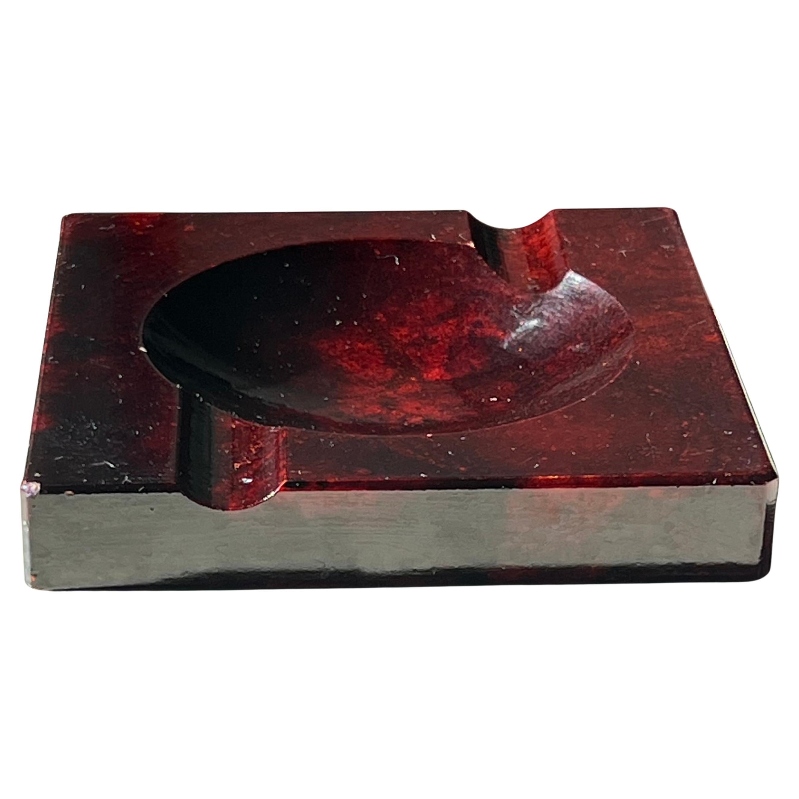 A vintage Italian blood red alabaster ashtray, circa 1960