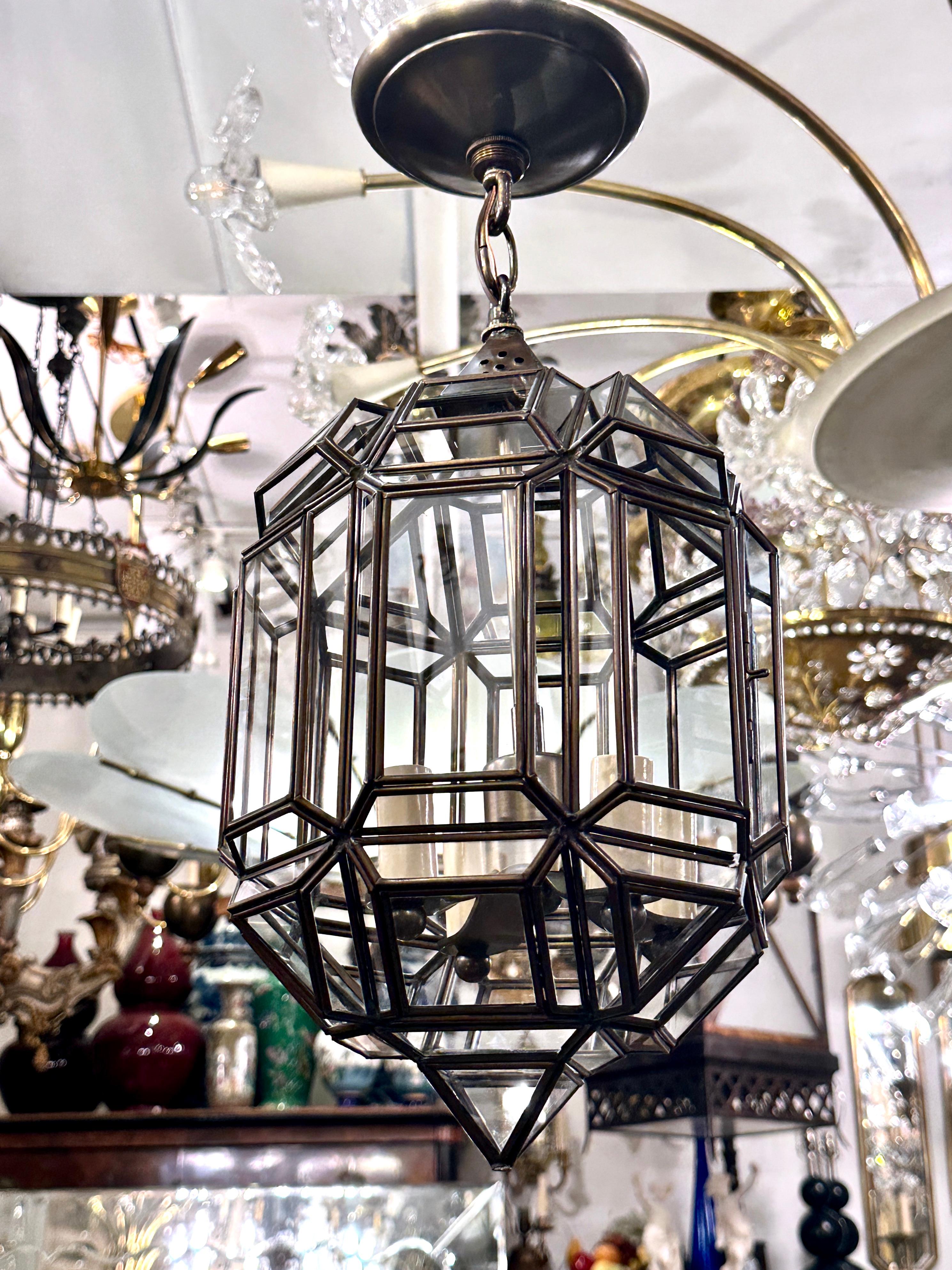 A circa 1960's Italian lantern with faceted body and 4 interior lights.

Measurements:
Drop: 19