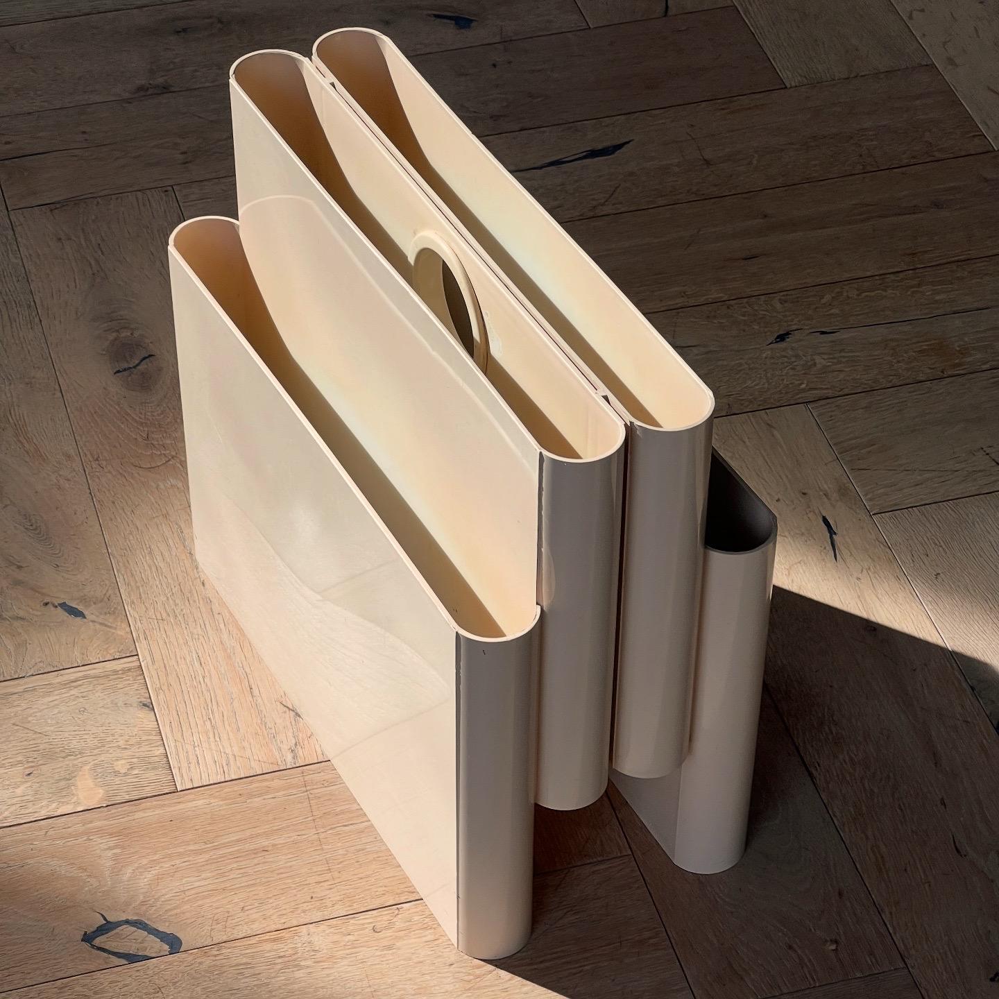 A vintage Italian modernist magazine rack by Giotto Stoppino for Kartell, Milan 1970. Original and authentic, this piece is the design icon of mag racks. Pick up in central west Los Angeles or we ship worldwide.