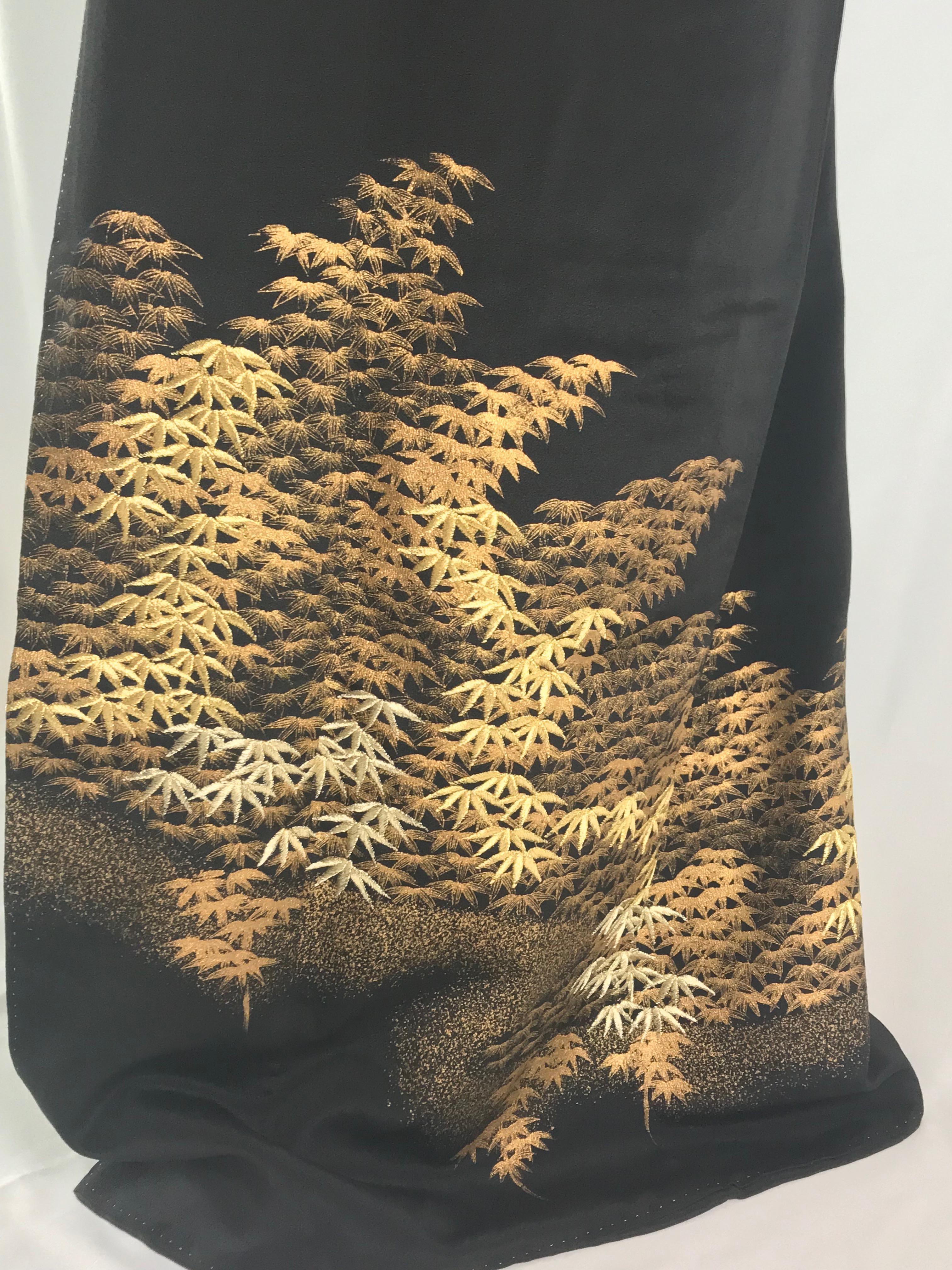 Embroidered and painted with golden maple trees.
About
●	Size estimate: One size fits most. Model is a size 10 but also looks great on a size 14.
●	Loose fitting that flatters most figures.
●	Bust: up to 40 inches
●	Full Length 164