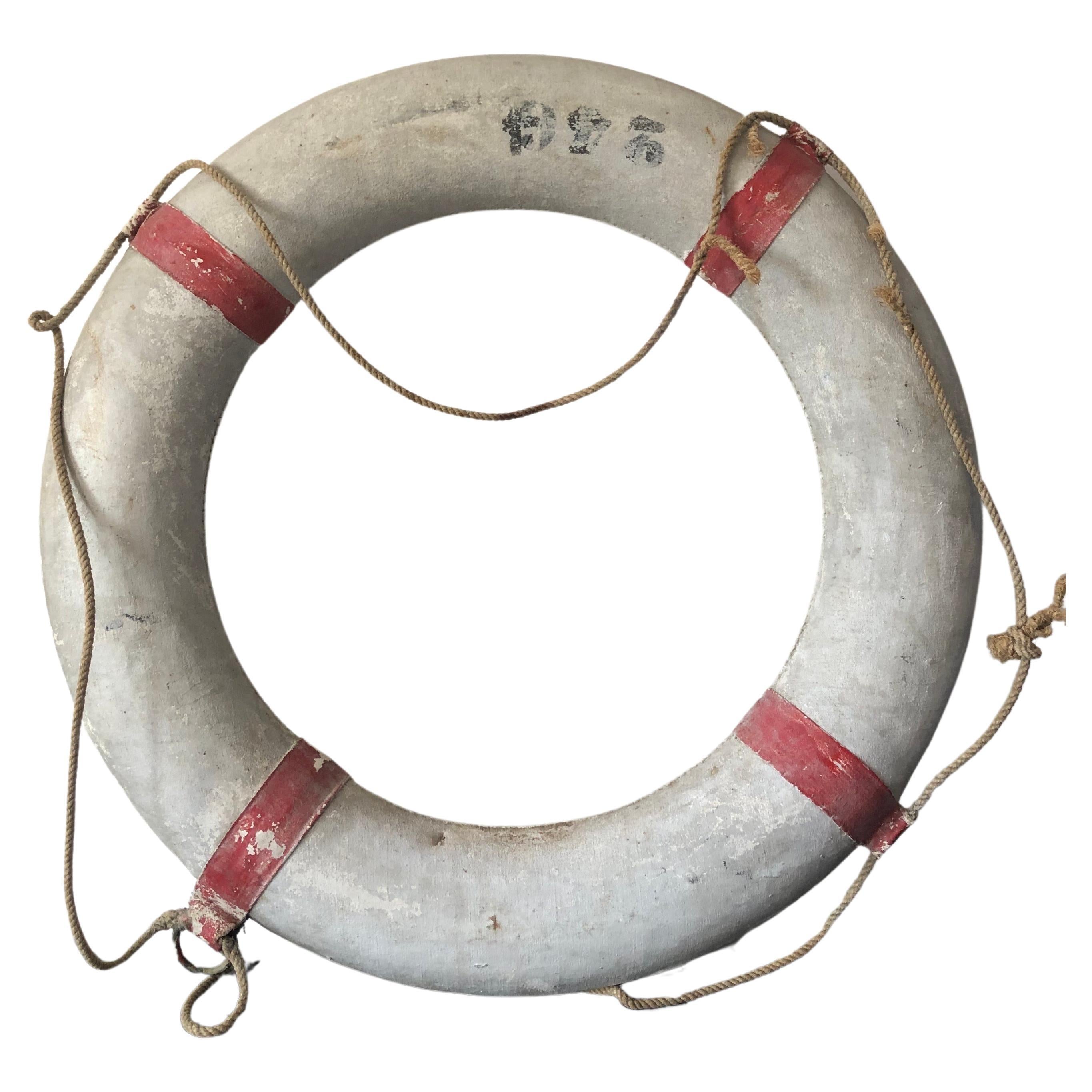 A vintage lifebuoy from a French ship, early 20th century.