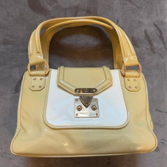 A Vintage Louis Vuitton Beige and White Leather Cruise Hand-Bag