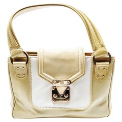 A Vintage Louis Vuitton Beige and White Leather Cruise Hand-Bag
