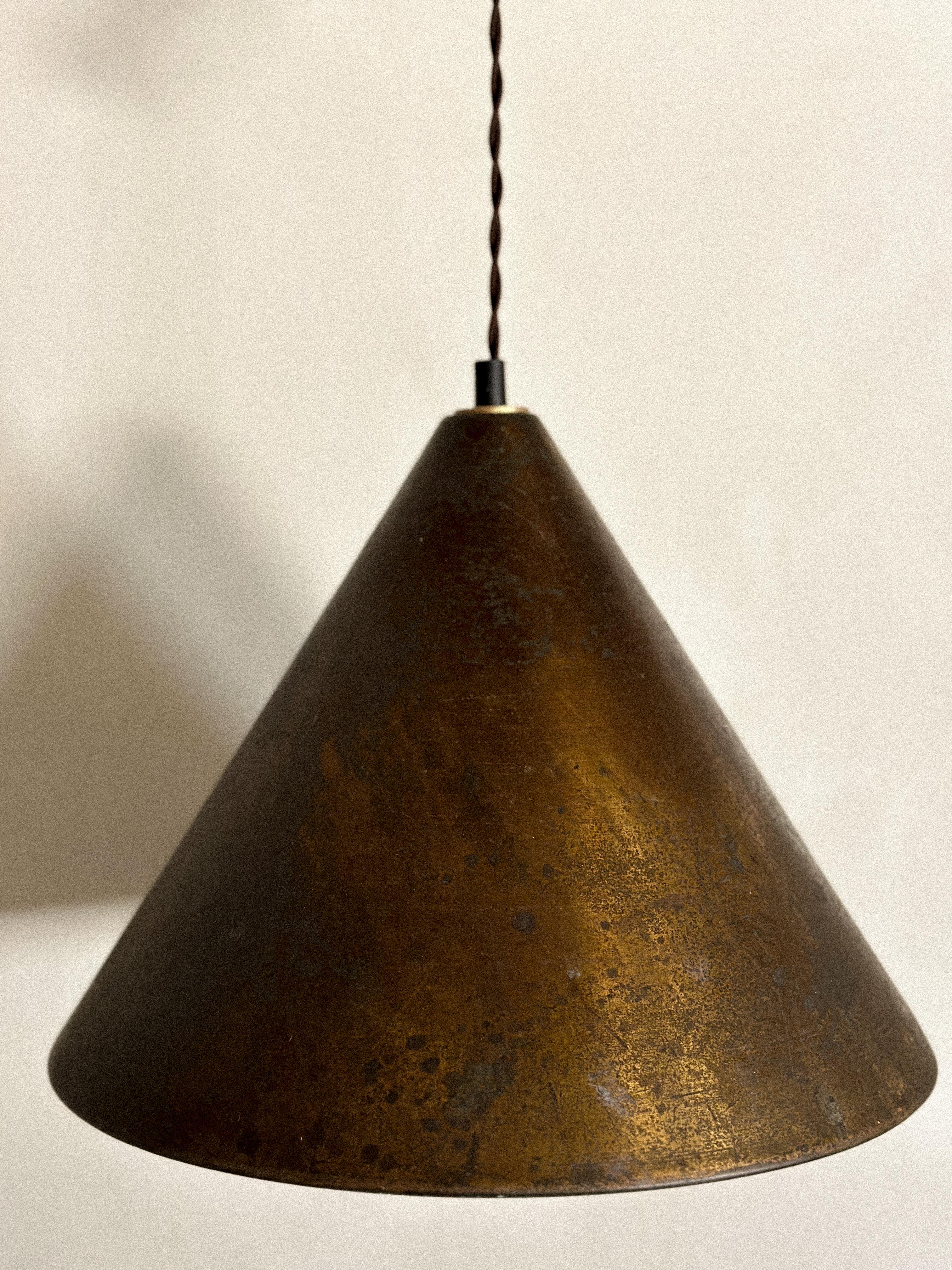 A Mid-century brass pendant with a rich patina. Fitted with a new wire and socket. 