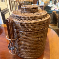 A Vintage Mid-Century Modern Woven Wicker Ice Bucket with Tongs