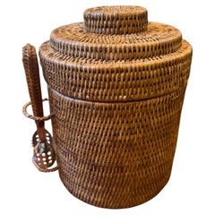 A Vintage Mid-Century Modern Woven Wicker Ice Bucket with Tongs